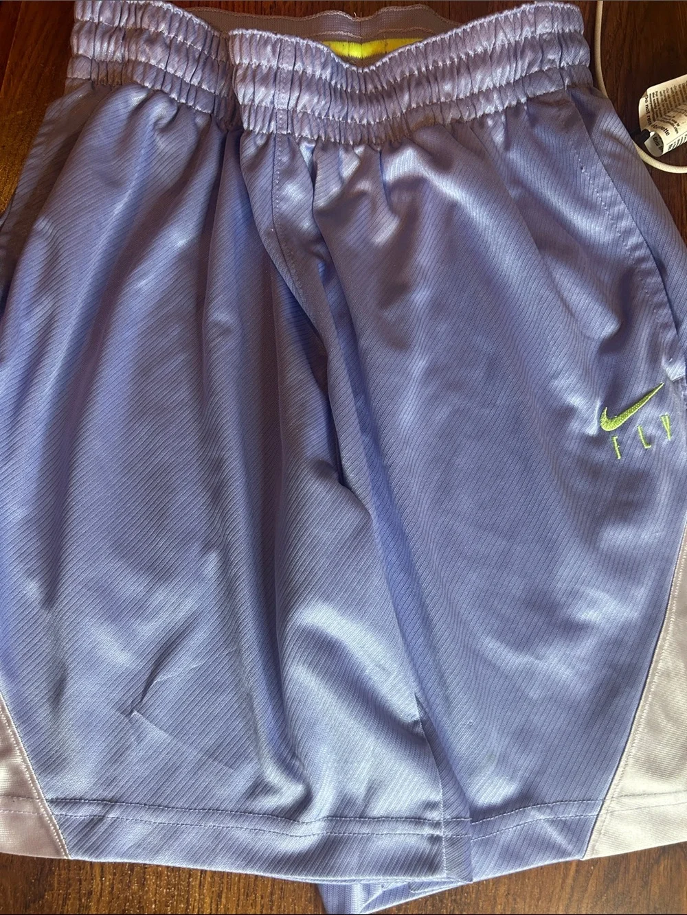 Nike Women’s Lavender Athletic Shorts with Neon Yellow Logo